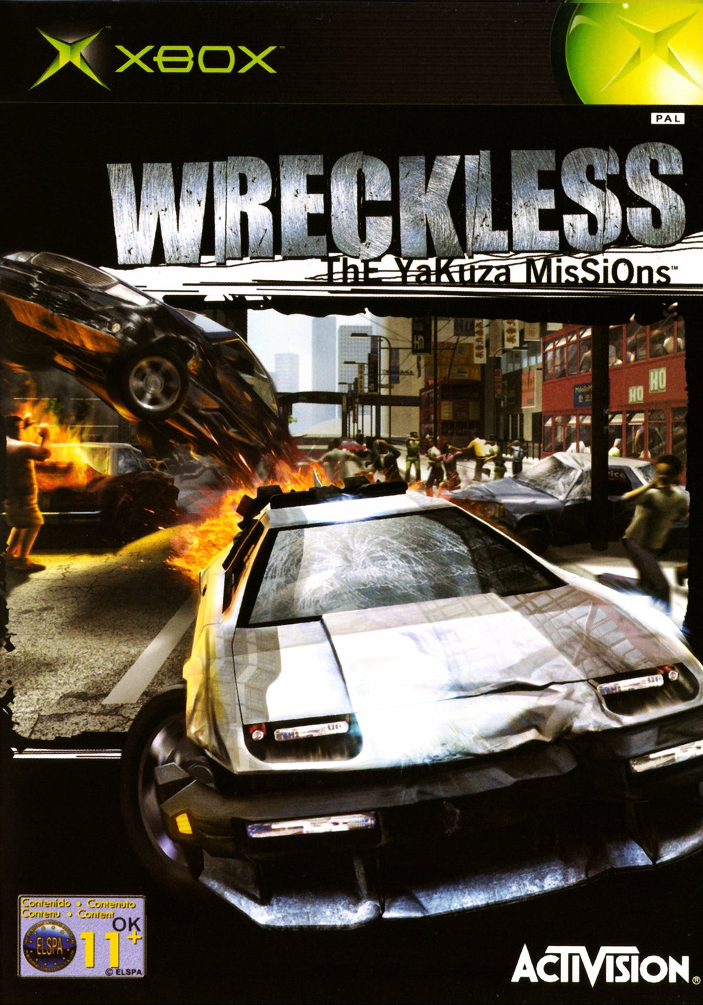 Front cover of the Xbox game Wreckless: Unleash Your Mission, featuring a silver sports car in a fiery urban street scene, with the Xbox and Activision logos visible.